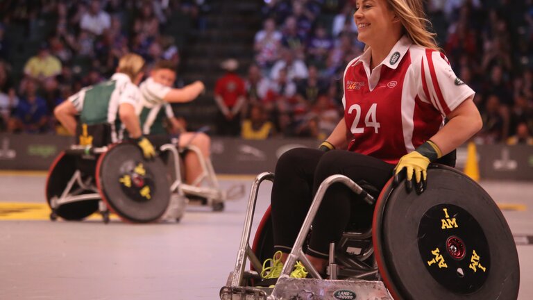 Frau im Rollstuhl, Behindertensport | © Audi Nissen/unsplash